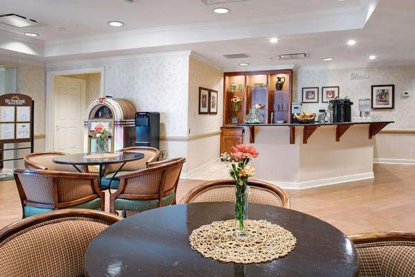 Common area with seating and a coffee station in Sunrise of Flossmoor