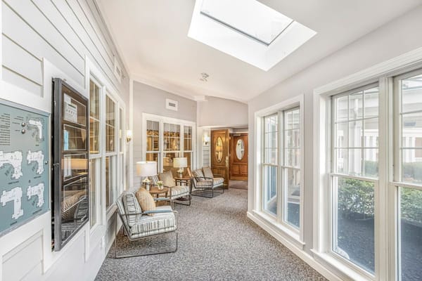 Interior view of the lobby with seating and natural light