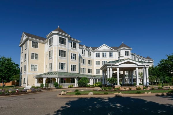 Front view of the Sunrise of McCandless facility with a clear blue sky