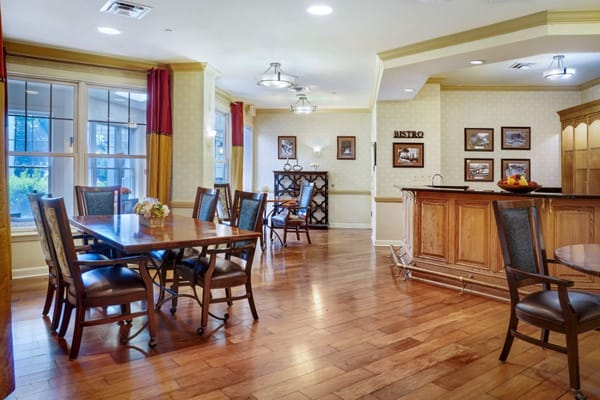 Interior view of the bistro area with tables and seating.