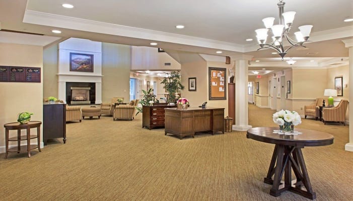 Lobby area with seating and a reception desk
