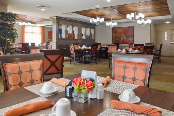Dining room with neatly arranged tables and decor