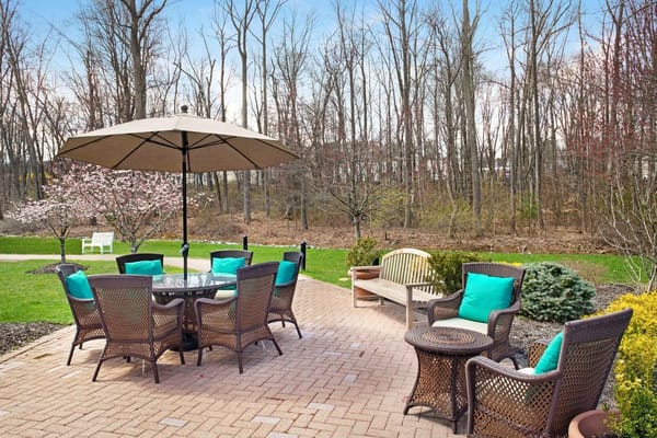 Outdoor seating area with umbrellas and chairs
