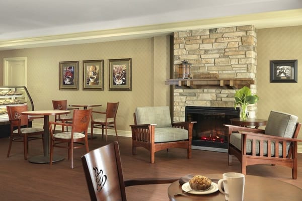 Cozy common area with seating and fireplace