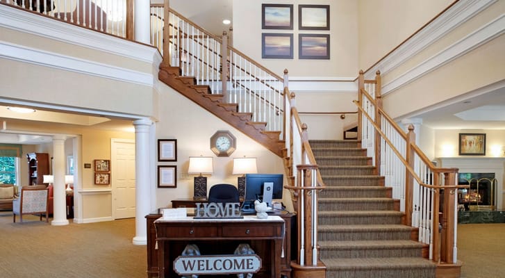 Lobby area featuring a staircase and reception desk