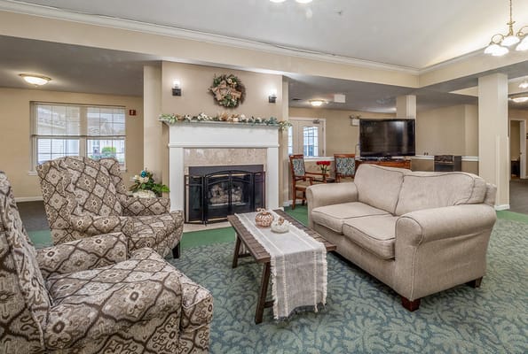 Cozy living room with seating and fireplace
