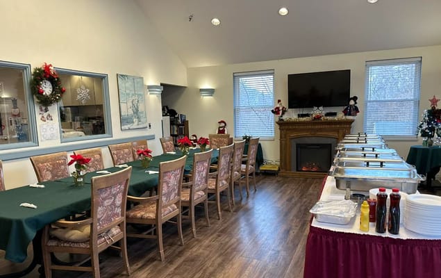Dining area with tables set for a meal at The Berkeley Retirement Home.