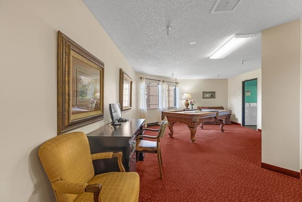 Bright interior of a resident's room with furniture