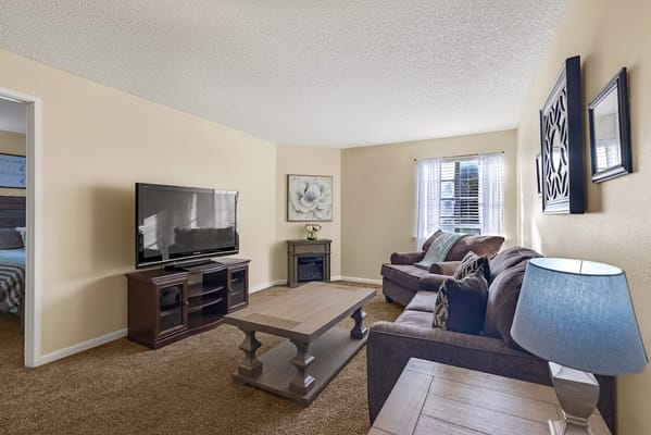 Cozy common area with a television and seating.