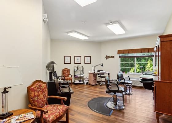 Interior view of a salon area with styling chairs