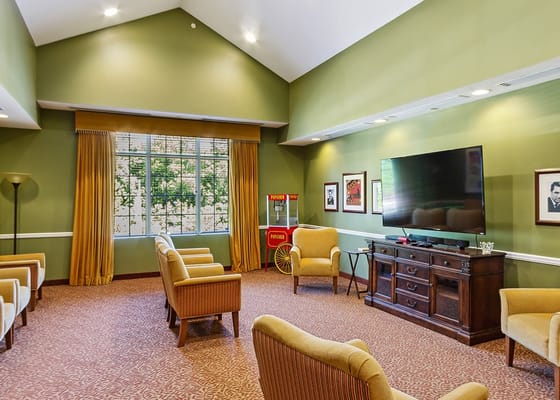 Common area with seating and television