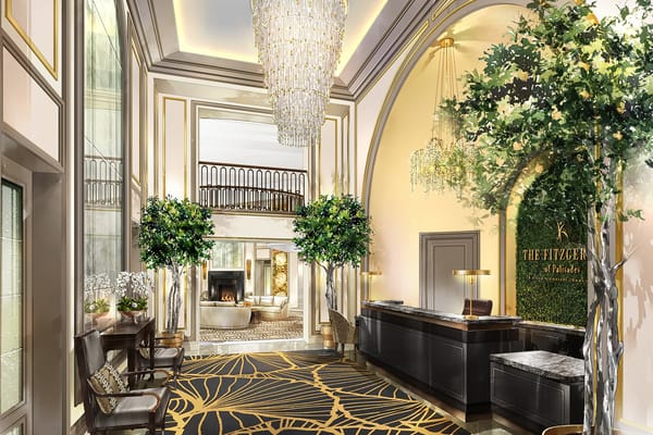 Stylish lobby area with chandeliers and seating at The Fitzgerald