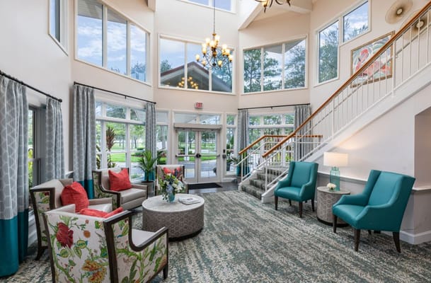 Bright and inviting lobby with comfortable seating and large windows