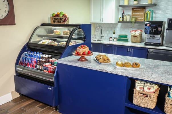 Kitchen area with a display of food and drinks