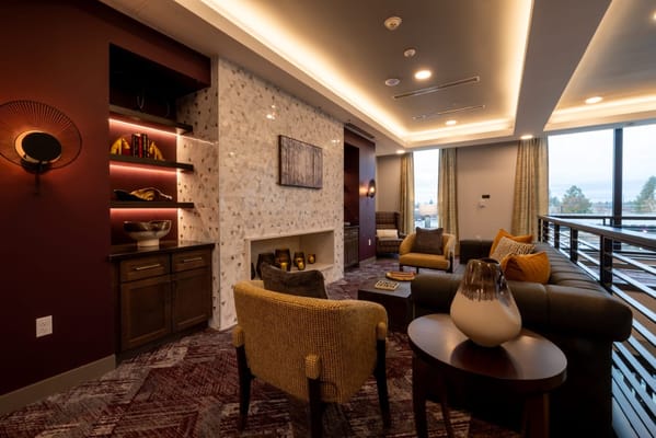 Inviting living room with comfortable seating and decorative shelving