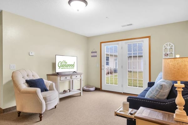 Cozy common area with seating and television