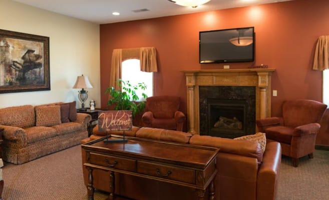 Cozy common area with comfortable seating and fireplace