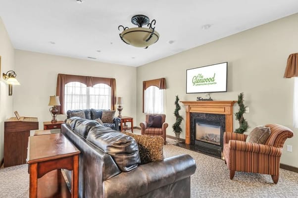 Comfortable lounge area with seating and a fireplace