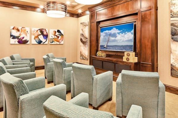 Comfortable common area with seating and artwork