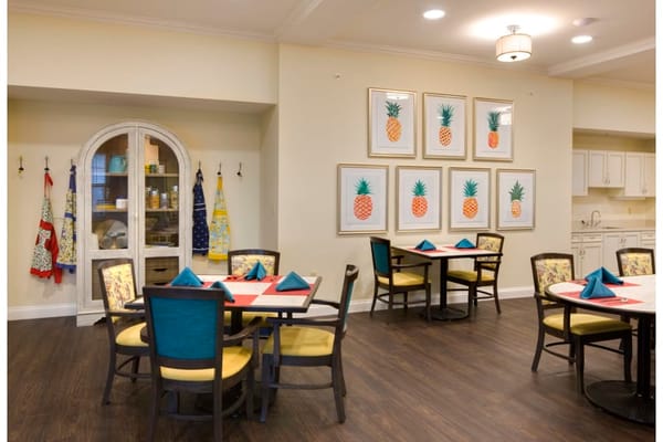 Bright dining area with tables set for meals