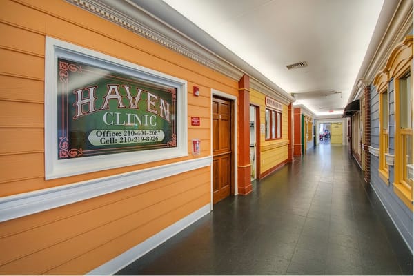 Hallway with Haven Clinic sign in a senior living facility