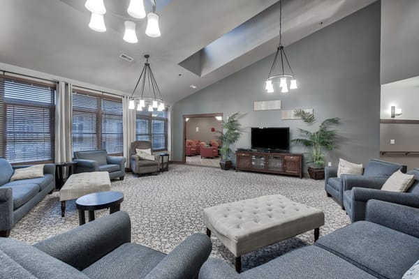 Spacious living room with comfortable seating and natural light