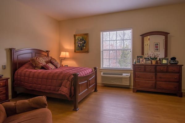 Cozy private bedroom with furniture and decor