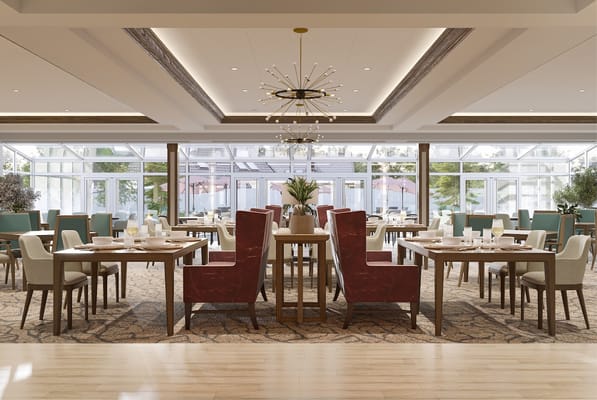 Bright and modern dining room setting with tables and chairs.