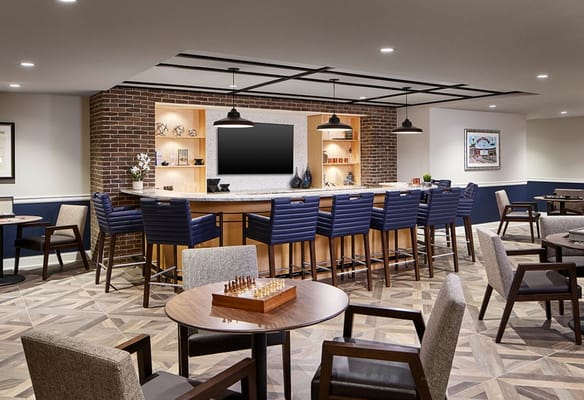 Cozy lounge with seating and a bar