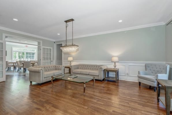 Spacious living room with stylish furniture and natural lighting