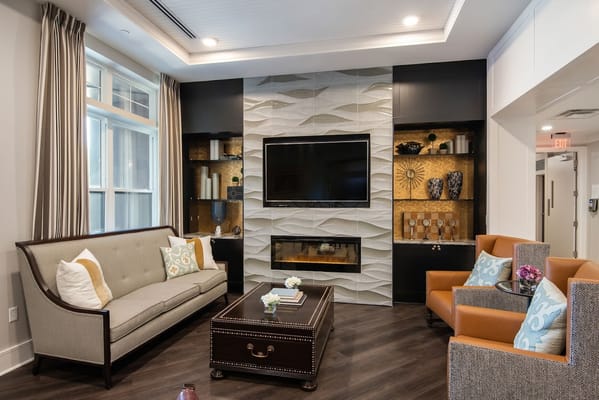 Cozy common area with comfortable seating and TV