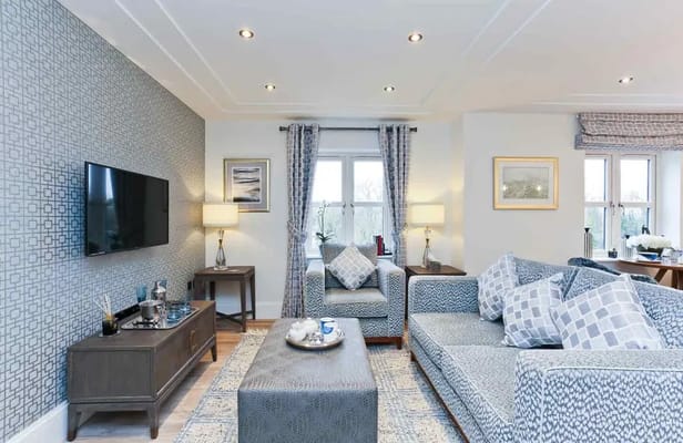 Modern living room with comfortable sofas and TV