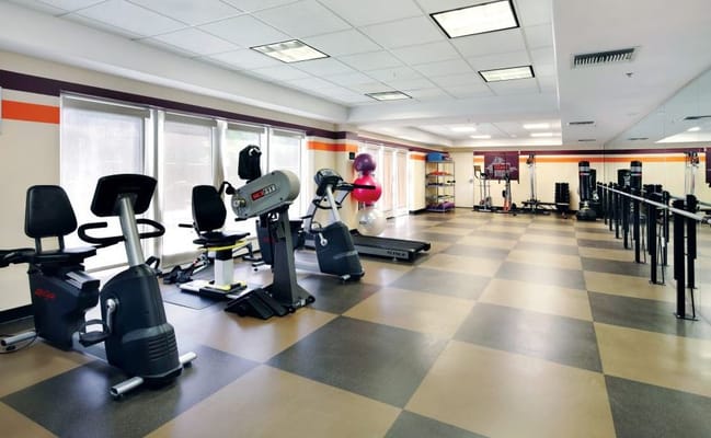 Well-equipped fitness center with exercise machines