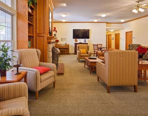 Comfortable living room with seating and TV