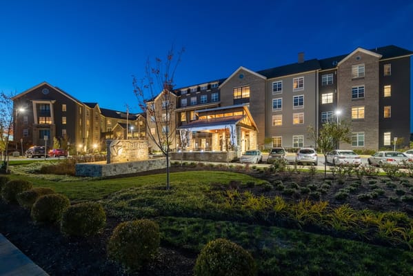 Exterior view of Tribute at Melford illuminated at night
