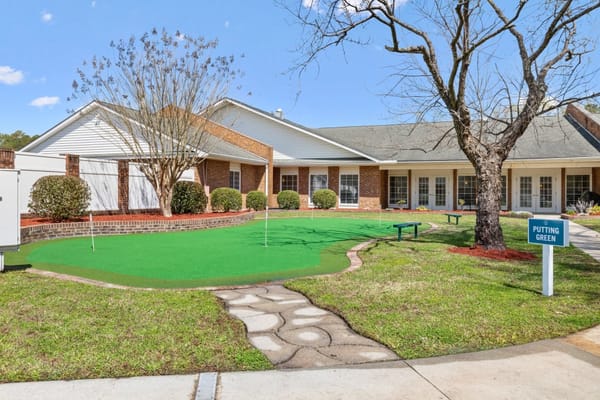 Outdoor putting green at the facility