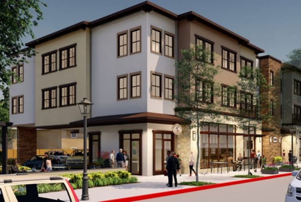 Exterior view of the Villa Toscana facility with people