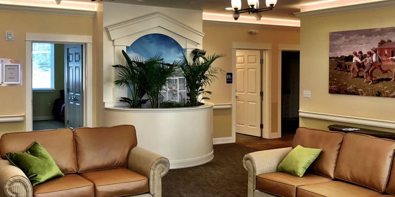 Cozy lobby area with seating and plants