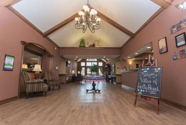 Welcoming lobby with seating and a welcome sign