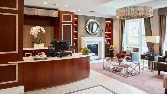 Elegant lobby area with reception desk and decor