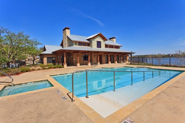 Exterior view of a pool and building at the facility