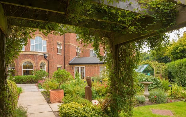 View of a landscaped garden area at Westbourne Tower Care Home