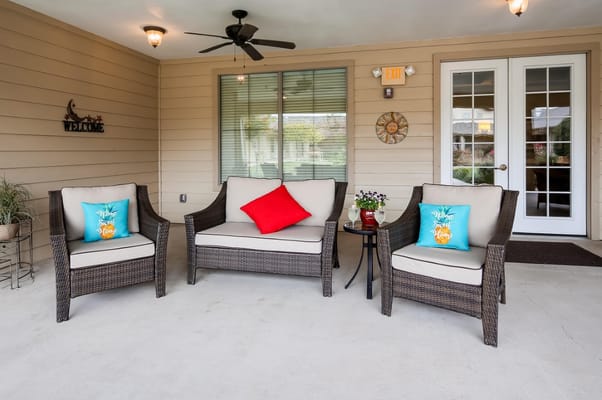 Comfortable patio seating with colorful cushions
