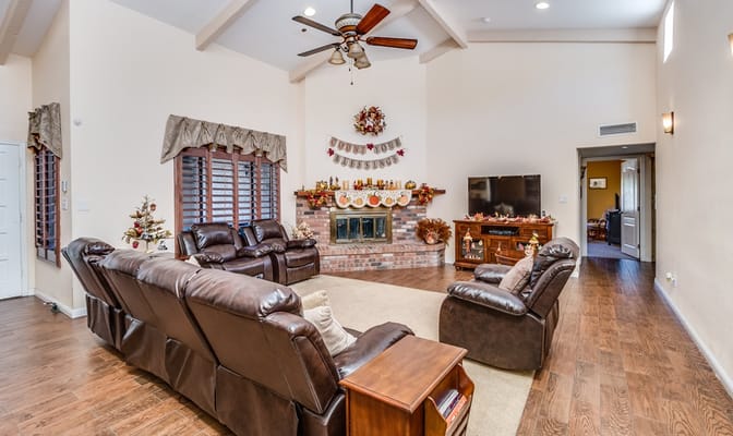 Bright common area with comfortable seating and decorations