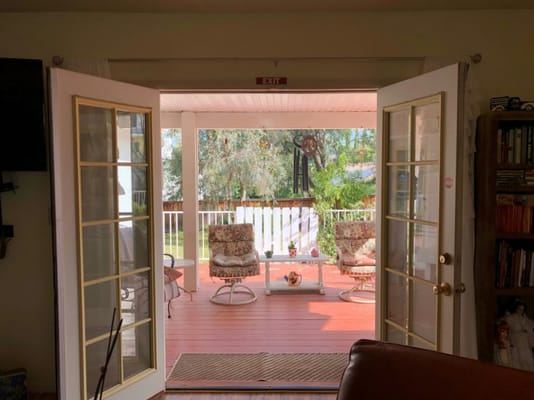 View from inside a facility looking out to a garden