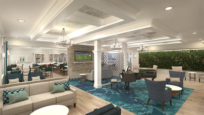 Bright and inviting common area with seating and decor