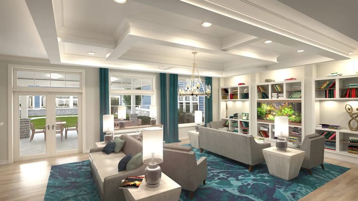 Bright and welcoming common area with seating and bookshelves