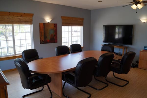 Bright interior of a common area with a conference table