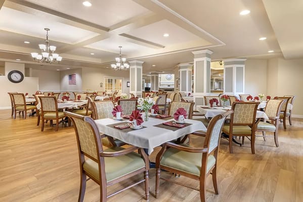 Bright dining area with tables set for meals
