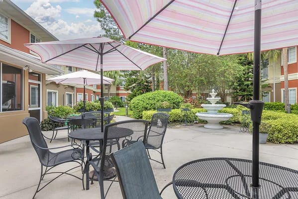 Patio area with umbrellas and seating